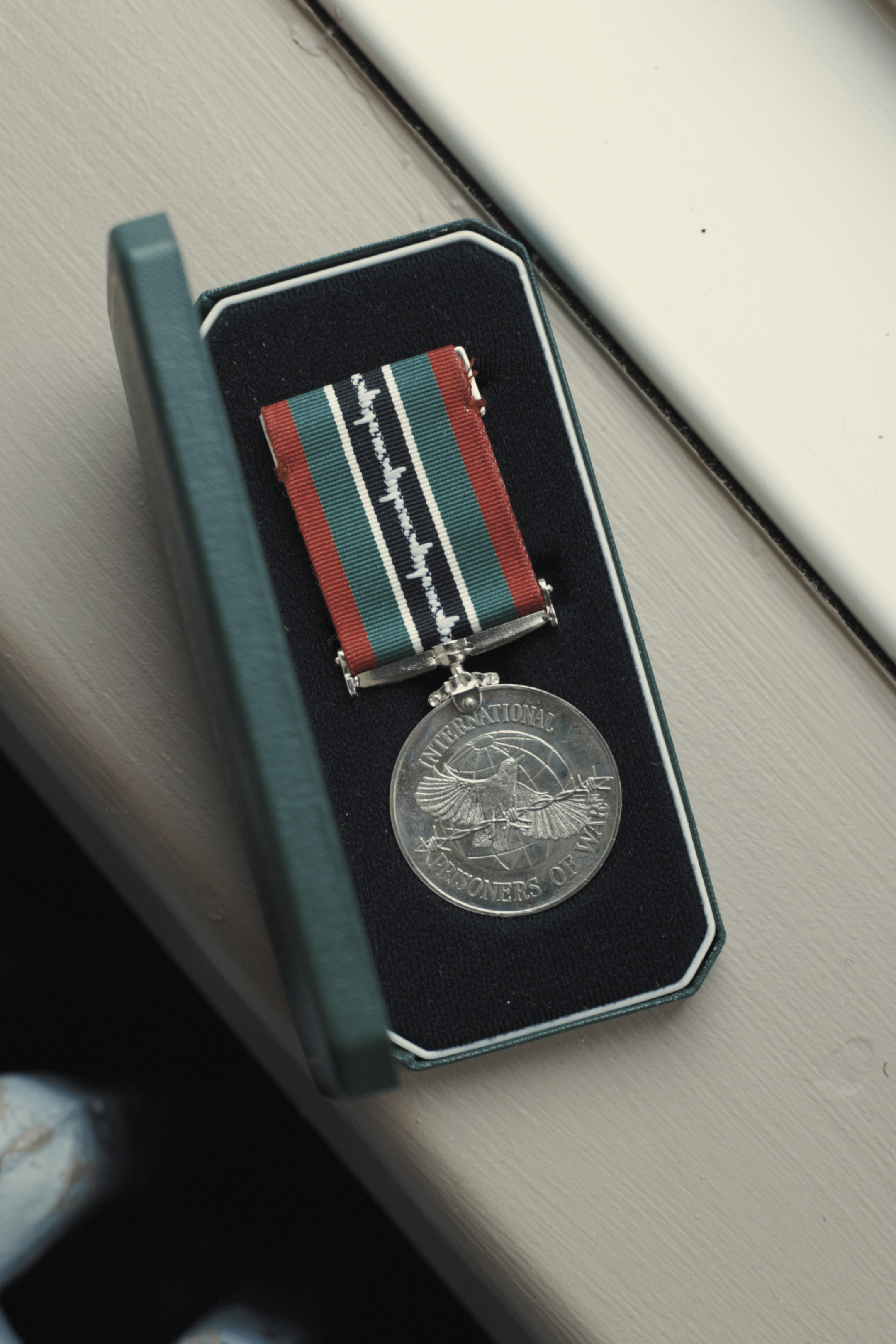 Image shows a commemorative Allied Ex-Prisoners of War medal.